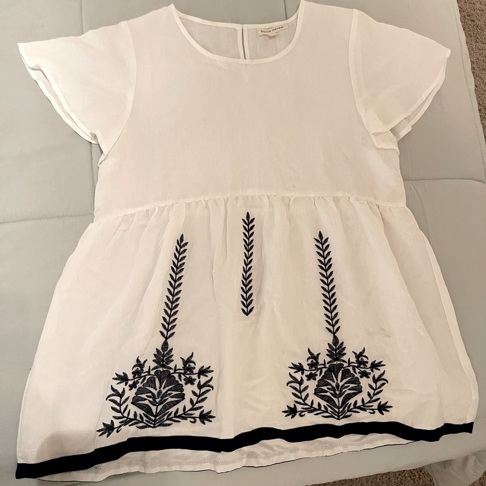 Babydoll top from Stevie Hender Boutique. Size Large.